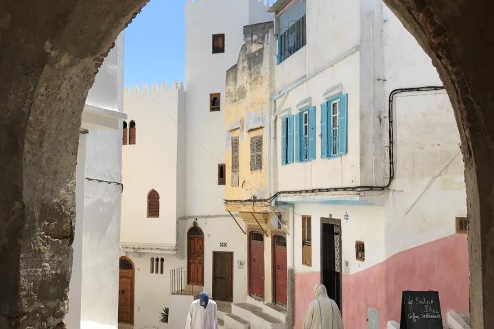 a close up of a street in front of a building