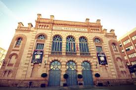 a large building with Gran Teatro Falla in the background